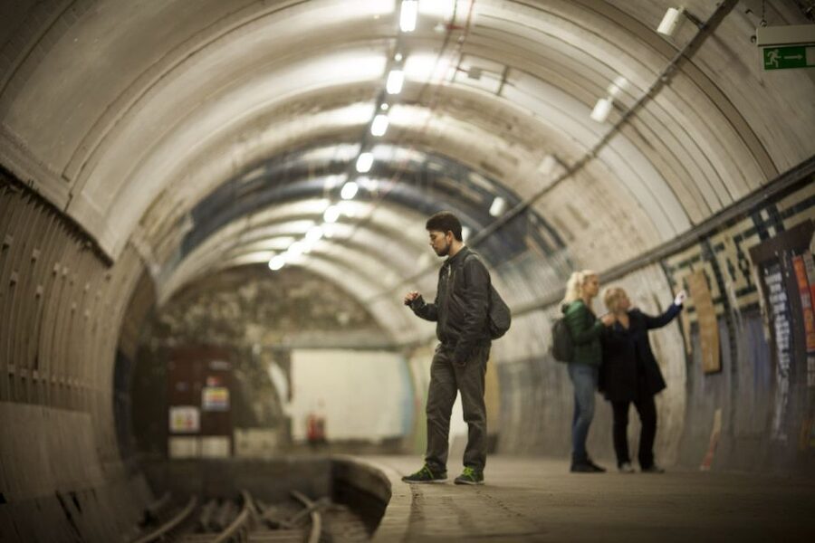 Aldwych: Hidden Tube Station Guided Tour - Original lifts and the walk below street level