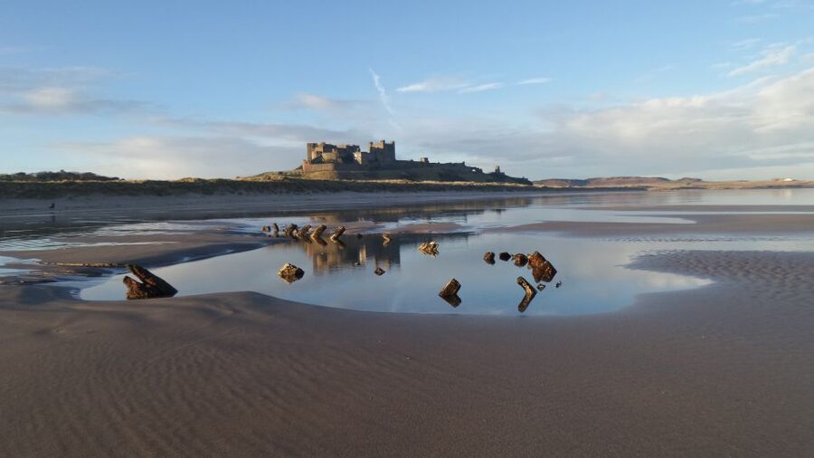 Alnwick Castle and Scottish Borders Tour from Edinburgh - Bamburgh: beach views and a 5th-century castle