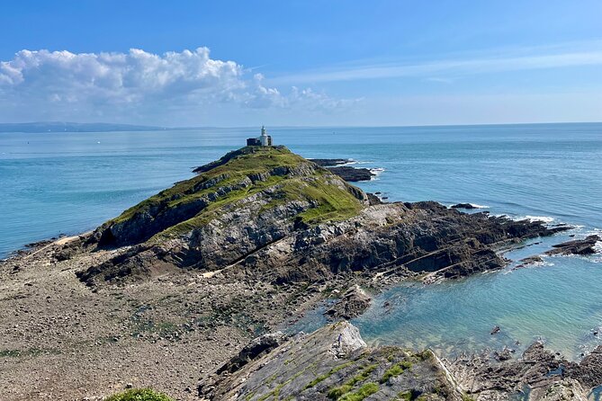 Cardiff: Gower Peninsula's Cliffs Scenic Day Tour - Mumbles: shops, seafront, and a Norman castle