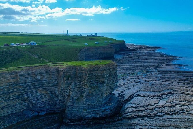 Cardiff: South Wales Cliffs, Beaches & Castles Day Tour - Nash Point combines cliffs, seabirds, and a lighthouse
