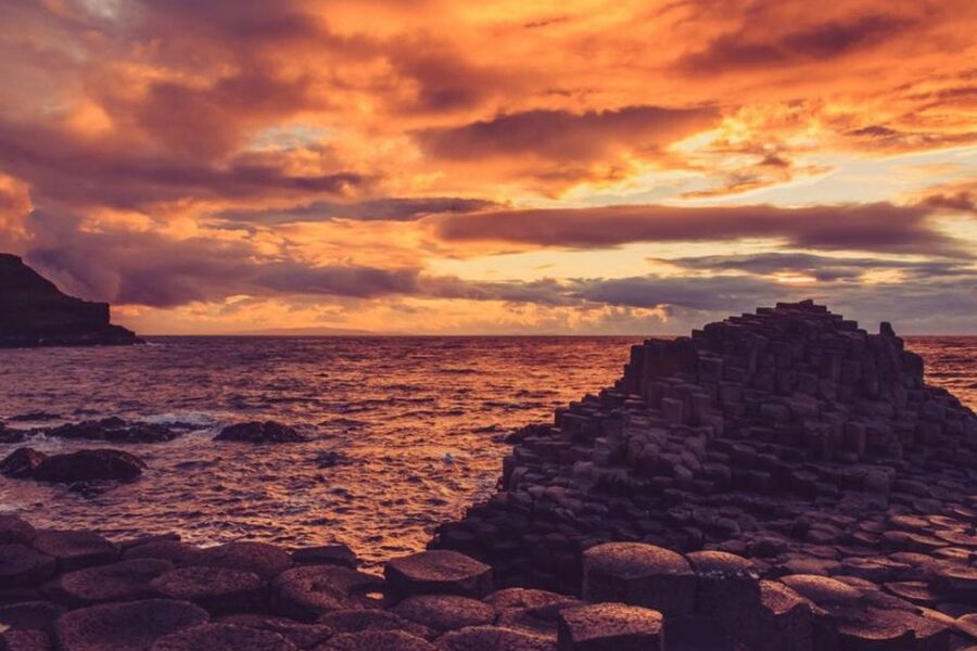 Dublin: Giant's Causeway, Dark Hedges & Titanic Guided Tour - Walking onto the Giants Causeway