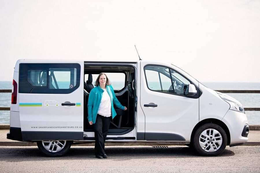 From Aberdeen: Coastal Villages of Aberdeenshire Tour - The guide and the seven-person van