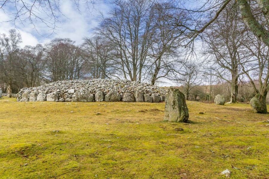Loch Ness and the Highlands 1-Day Tour from Aberdeen - Loch Ness by boat, with Urquhart Castle in view