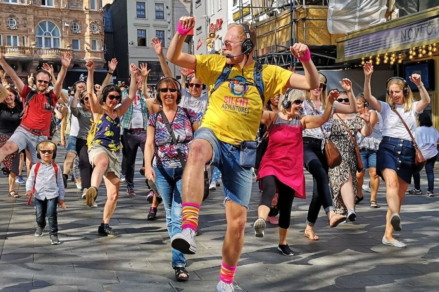 Manchester: Silent Disco Adventure Tour - Deansgate becomes your first dance floor